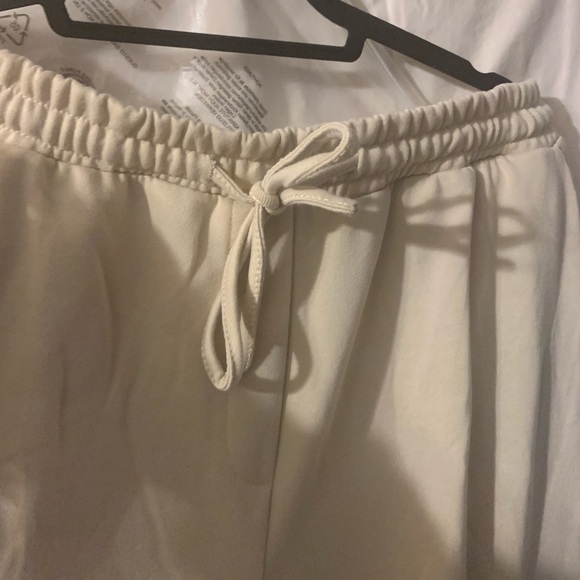 Cargo joggers in cream with drawstring elastic waist and ankles. New in bag. - Picture 5 of 9